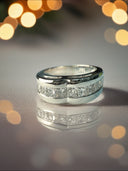 1.25 TCW lab diamond channel Set wedding band in 14k white gold.