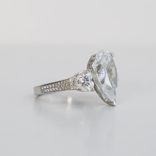 Eye-Catching 8 Carat Pear Shape IGI Certified Cubic Zirconia Ring with Heart Shape and Pave Accents - 12.75TCW