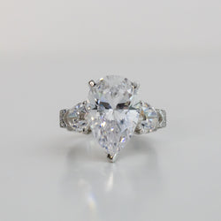 Eye-Catching 8 Carat Pear Shape IGI Certified Cubic Zirconia Ring with Heart Shape and Pave Accents - 12.75TCW