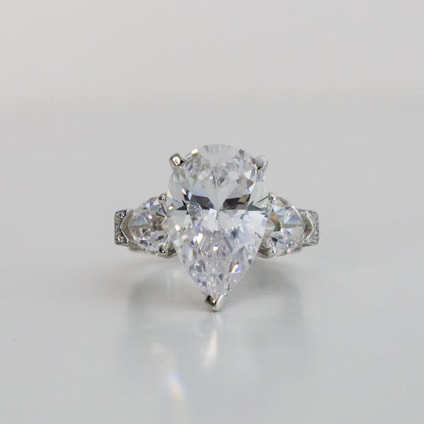 Eye-Catching 8 Carat Pear Shape IGI Certified Cubic Zirconia Ring with Heart Shape and Pave Accents - 12.75TCW