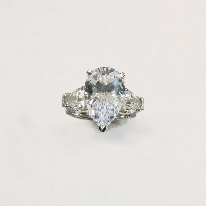 Eye-Catching 8 Carat Pear Shape IGI Certified Cubic Zirconia Ring with Heart Shape and Pave Accents - 12.75TCW