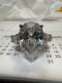 Eye-Catching 8 Carat Pear Shape IGI Certified Cubic Zirconia Ring with Heart Shape and Pave Accents - 12.75TCW