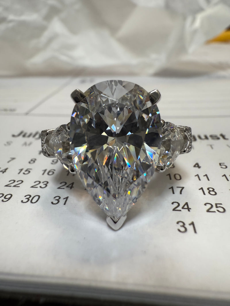 Eye-Catching 8 Carat Pear Shape IGI Certified Cubic Zirconia Ring with Heart Shape and Pave Accents - 12.75TCW