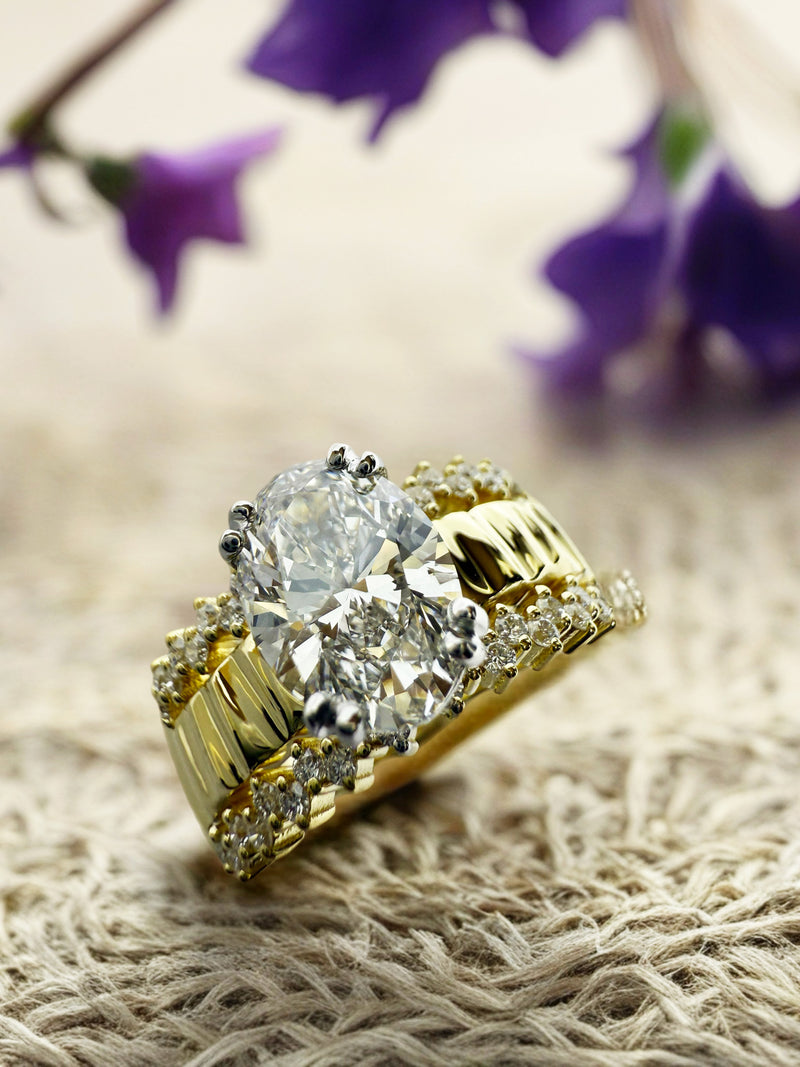 2.08 Carat Oval Cubic Zirconia Ring in 14k Gold – 10mm Wide Shank