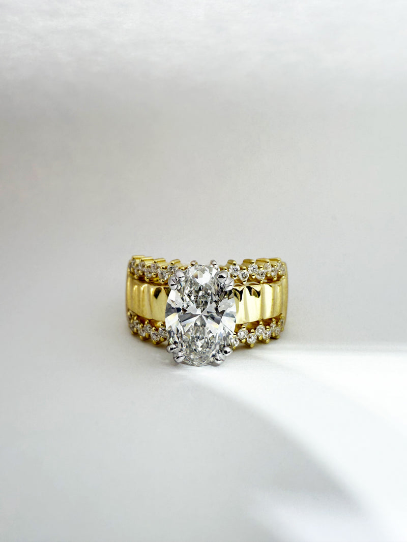 2.08 Carat Oval Cubic Zirconia Ring in 14k Gold – 10mm Wide Shank