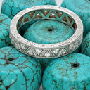 Cubic Zirconia Eternity Band With Triangle Design Hand Engraved
