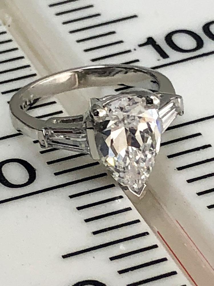 3 carat Pear shape cz tapered baguettes on the sides 14k white gold
