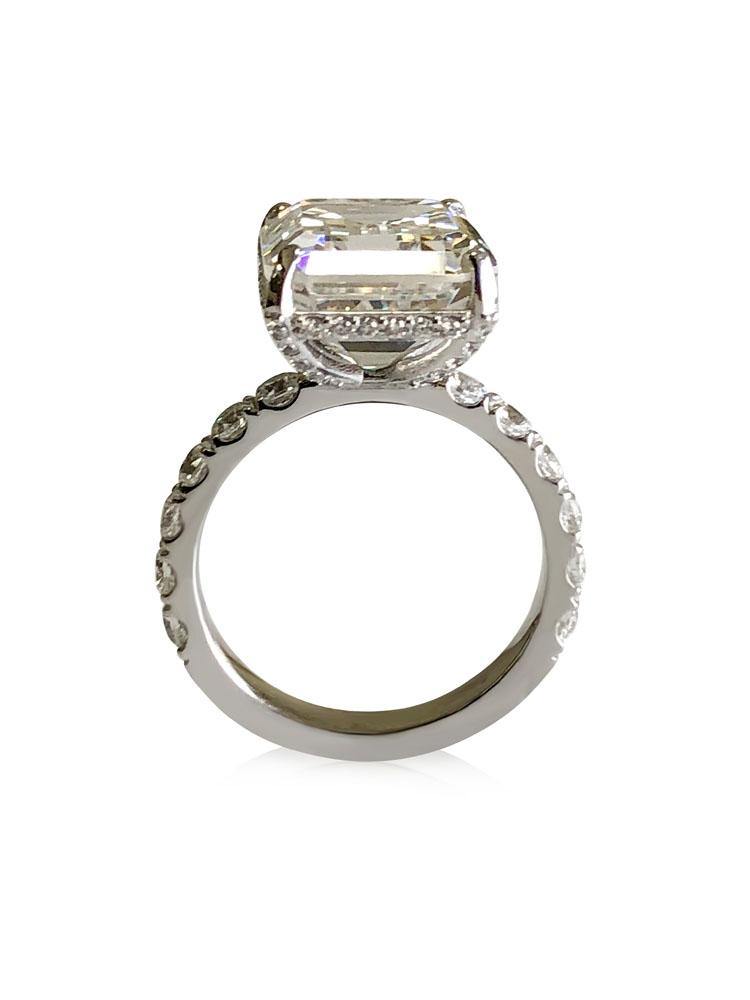 5 Carat Emerald cut 12 by 10 Cubic ZIrconia Engagement ring with pave halo 14K White gold