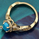 Oval 1 Carat Turquoise Center In Pave Set Halo 14K Yellow Gold Ring.